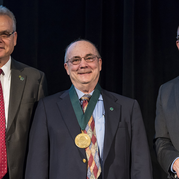 Robert Vince is honored onstage for his National Academy of Inventors Fellowship